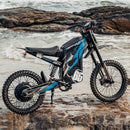 Happyrun G300 Pro Electric Dirt Bike (SAK27360) Saksby - Blue on Rocks Beside Ocean
