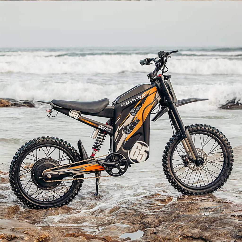 Happyrun G300 Pro Electric Dirt Bike (SAK27360) Saksby - Orange on Rocks Beside Ocean