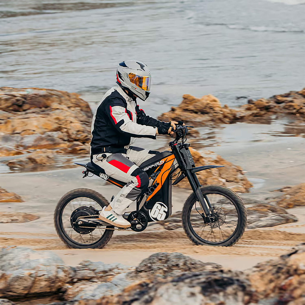 Happyrun G300 Pro Electric Dirt Bike (SAK27360) Saksby - Orange With Man Riding on Dirt