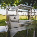 Tagwood BBQ Argentine Santa Maria Wood Fire And Charcoal Gaucho Grill BBQ03SS Mini SAK35620 - Lifestyle On Grass Close Up