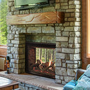 A Clean-face Natural Gas Direct Vent Fireplace From White Mountain Hearth, Installed In A Home With A Stone Surround And A Flat-screen TV Above It.
