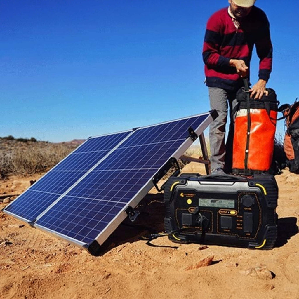 LION ENERGY Safari LT 500W/450WH Portable Solar Powered Generator - Lifestyle Connected To Solar Panel