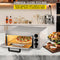 Commercial Electric Pizza Oven With A Pizza Inside, Surrounded By Snacks And Drinks In A Kitchen Setting (SAK92582) - Saksby Wholesale