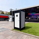 42-Inch One-Person Portable Outdoor Toilet Cabin - Saksby Wholesale - Front  Left View In Concert Hall
