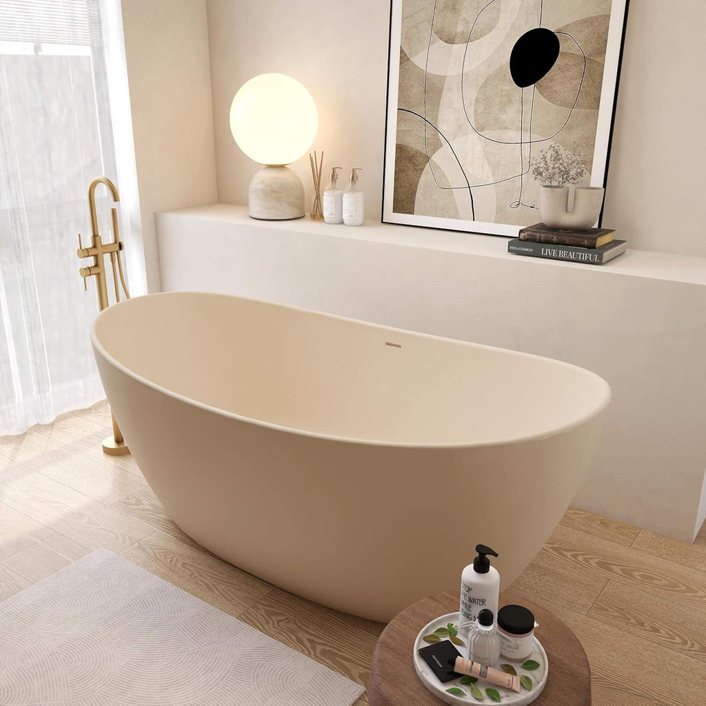 [65X33-Inch] Freestanding Oval Stone Resin Soaking Tub With Overflow (SAK39231) - Saksby Wholesale - Lifestyle Beige In Bathroom Front Left View