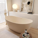 [65X33-Inch] Freestanding Oval Stone Resin Soaking Tub With Overflow (SAK39231) - Saksby Wholesale - Lifestyle Beige In Bathroom Front Left View