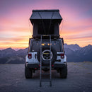 Aluminum 2-3 People Hard Shell Rooftop Tent With Tri-Color LED Lighting And Memory Foam Mattress (SAK57409) - Saksby Wholesale - Lifestyle Front View On SUV Dusk