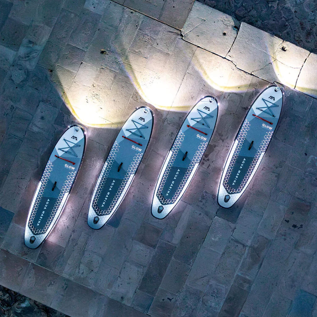 Aqua Marina Glow 10FT All-Around ISUP With Ambient Light System And Safety Leash [BT-24GL] (SAK48269) - Saksby Wholesale - Lifestyle With Four On Shore