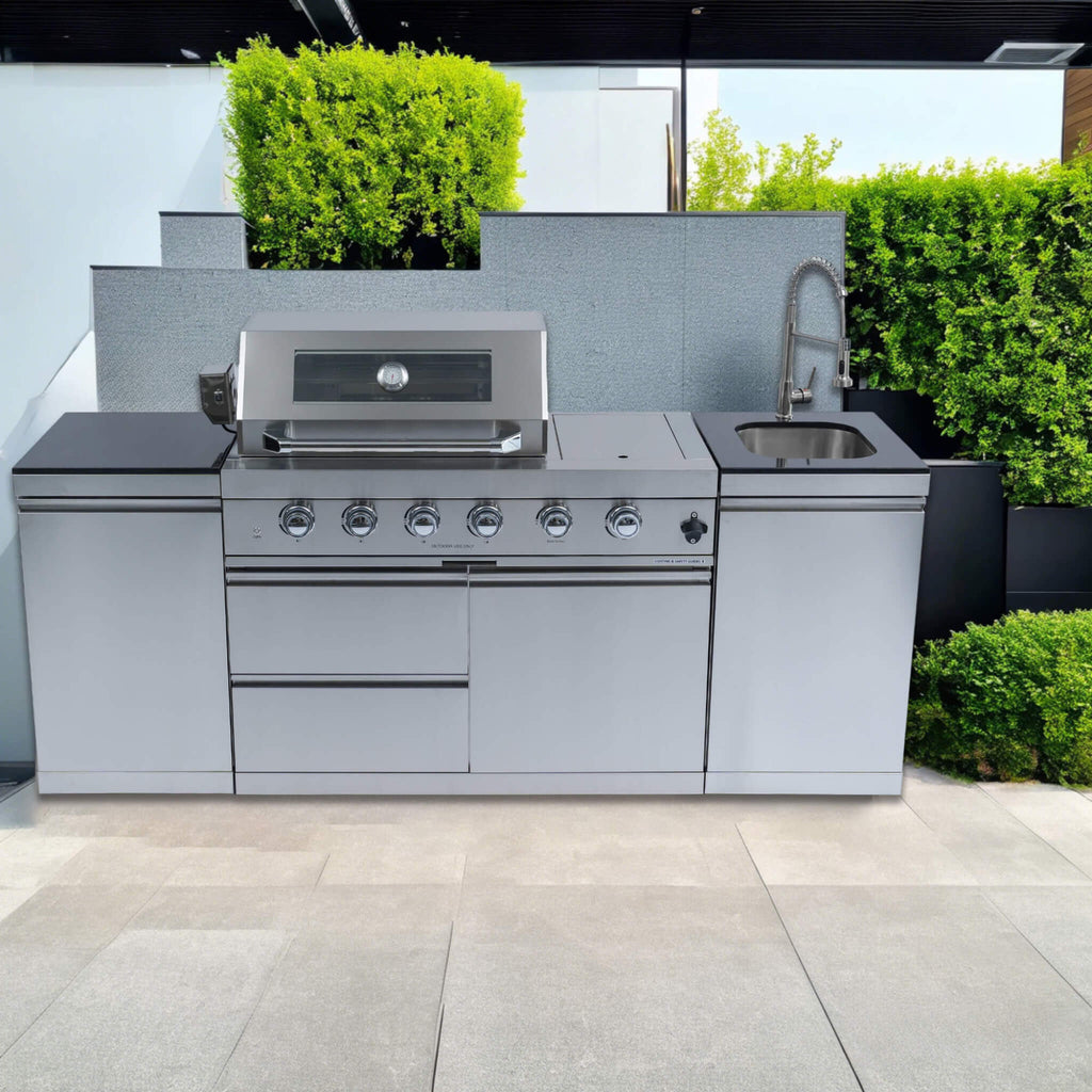 Castelle Flame Stainless Steel Outdoor BBQ Kitchen Island With 46-Inch 4-Burner 85K BUT Grill, Rotisserie Kit, And Cabinets (SAK93192) - Saksby Wholesale - Outdoor View