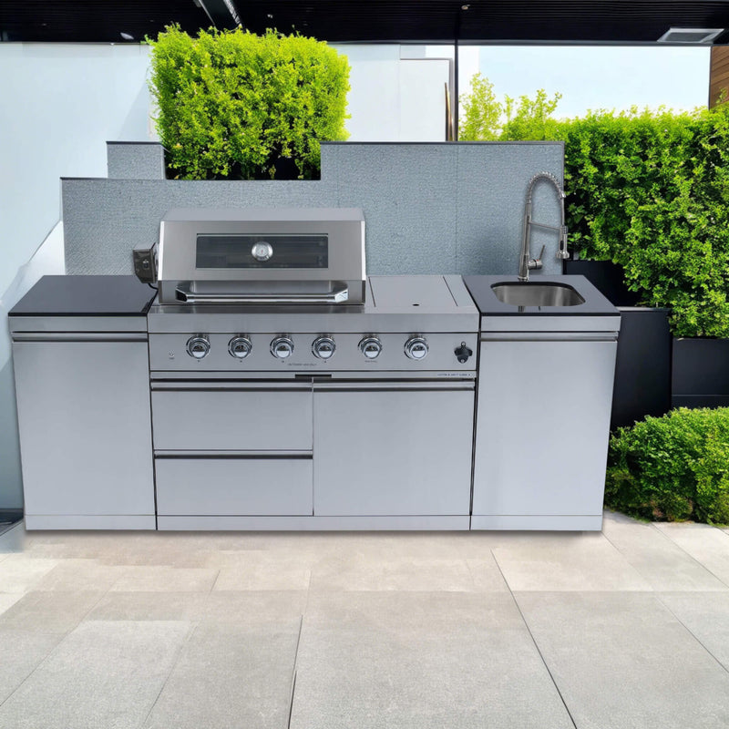 Castelle Flame Stainless Steel Outdoor BBQ Kitchen Island With 46-Inch 4-Burner 85K BUT Grill, Rotisserie Kit, And Cabinets (SAK93192) - Saksby Wholesale - Outdoor View