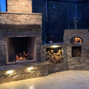 Chicago Brick Oven CBO-750 Wood Fired Pizza Oven DIY Kit With 38" x 28" Cooking Surface [CBO-O-KIT-750] (SAK51793) - Saksby Wholesale - Near Fireplace View With Gray Bricks