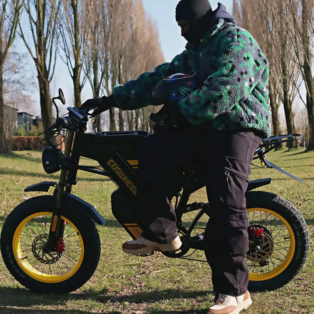 Coswheel GT20 Max 60V/40AH 2000W Dual-Battery Fat Tire Electric Bike (SAK30971) - Saksby Wholesale - Lifestyle Side Left View With Rider