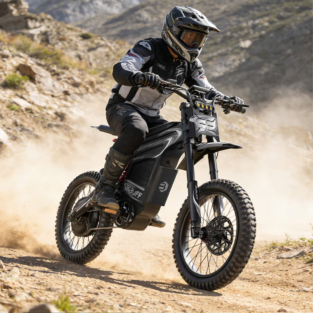 EKX GT600 7500W 72V30AH Full-Suspension Off-Road Electric Dirt Bike (SAK49037) - Saksby Wholesale - Lifestyle Front Right View On Dirt Road