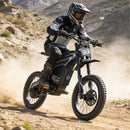 EKX GT600 7500W 72V30AH Full-Suspension Off-Road Electric Dirt Bike (SAK49037) - Saksby Wholesale - Lifestyle Front Right View On Dirt Road