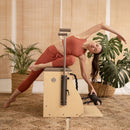 Elina Pilates Elite Wood Combo Chair With Handles [USA 700070] (SAK17301) - Saksby Wholesale - Lifestyle Image With Women Arcing