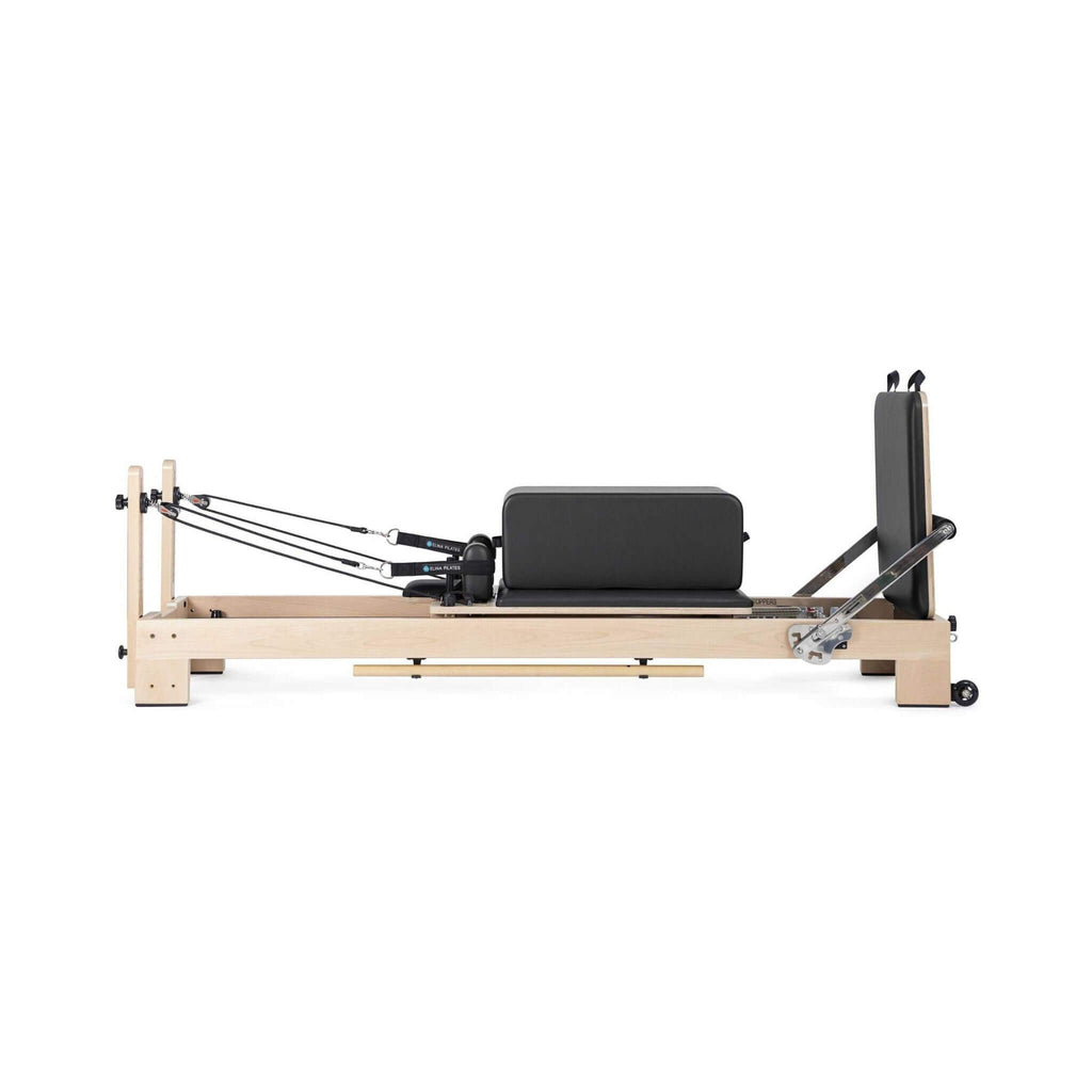 Elina Pilates Lignum Wooden Reformer With Adjustable Height Rope Pulleys [USA 100500] (SAK96321) - Saksby Wholesale - Side View With Luggage On Top