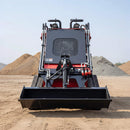 Heavy-Duty 13.5HP Mini Crawler Skid Steer Loader With Bucket (SAK39052) - Saksby Wholesale - Front View In Construction Site