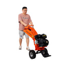 Heavy-Duty 7HP 212CC Gas Wood Chipper Shredder Mulcher (SAK59184) - Saksby Wholesale - Man In Use