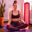 Hooga HG1500 Professional Full-Body Red Light Therapy Panel With Power Switches For Customized Treatments (SAK56821) - Saksby Wholesale - Lifestyle Image Doing Yoga