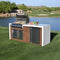 Kokomo Grills Professional Shiplap Outdoor Kitchen Island With Waterfall Edge Built In Grill And Refrigerator SAK65125 - Lifestyle Front Left Corner View On Grass
