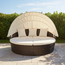 Large 76-Inch Outdoor Patio Rattan Daybed Sofa W/ Adjustable Table Top, Canopy & 3 Pillows (SAK91254) - Saksby Wholesale - Lifestyle Front Right View On Patio