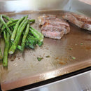 Le Griddle Ultimate Built-In / Countertop Griddle, 41" [GFE105] (SAK02878) - Saksby Wholesale - Demonstration Image With Steak