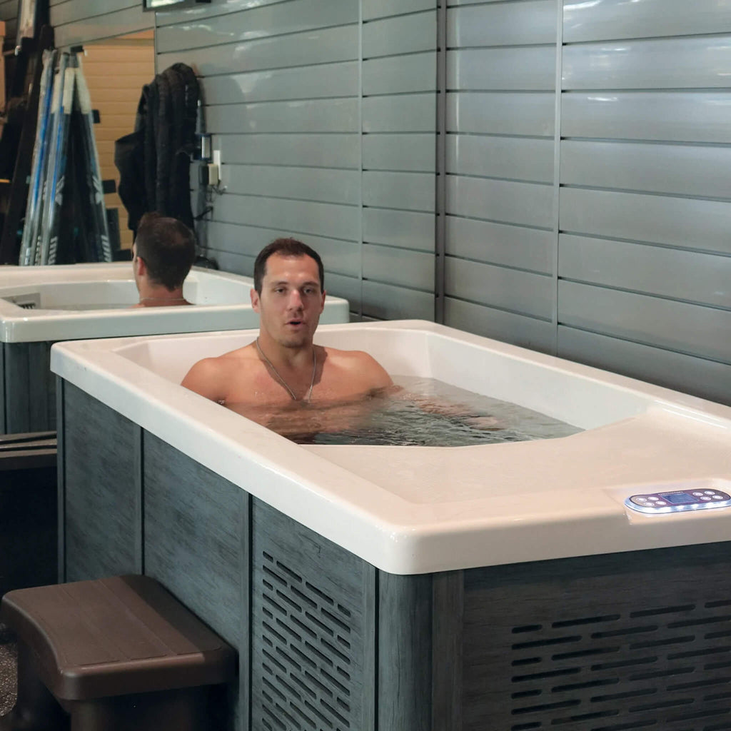 Modern Cold Plunge Spa Tub With Built-In Ozone And Multi-Coloured Exterior Lighting (SAK37605) - Saksby Wholesale - Lifestyle Front Right With Man Inside