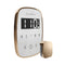 Digital Thermometer With Gold Casing On A White Background