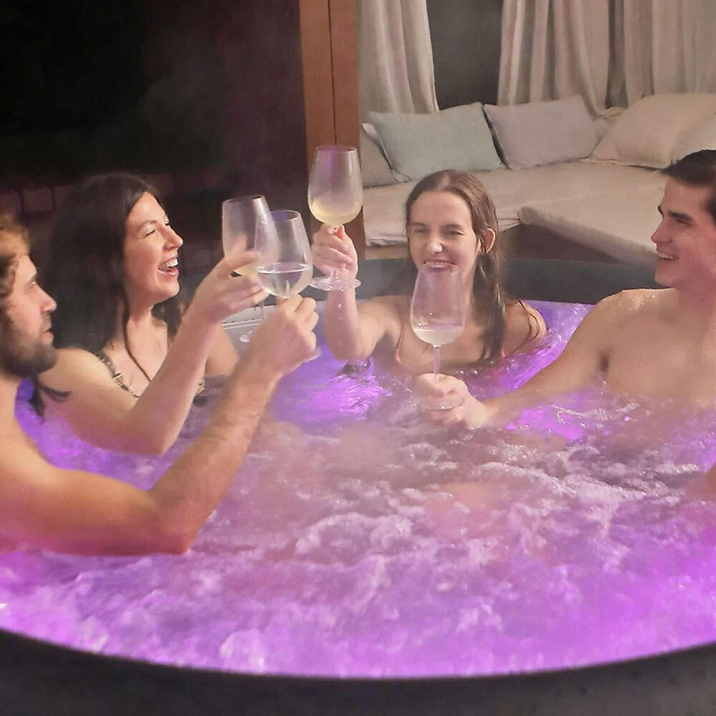 MSpa Aurora Urban Series Six-Person Inflatable Round Hot Tub With Hydro Massage [U-AU061] (SAK19375) - Saksby Wholesale - Lifestyle With Two Men And Two Women Close Up