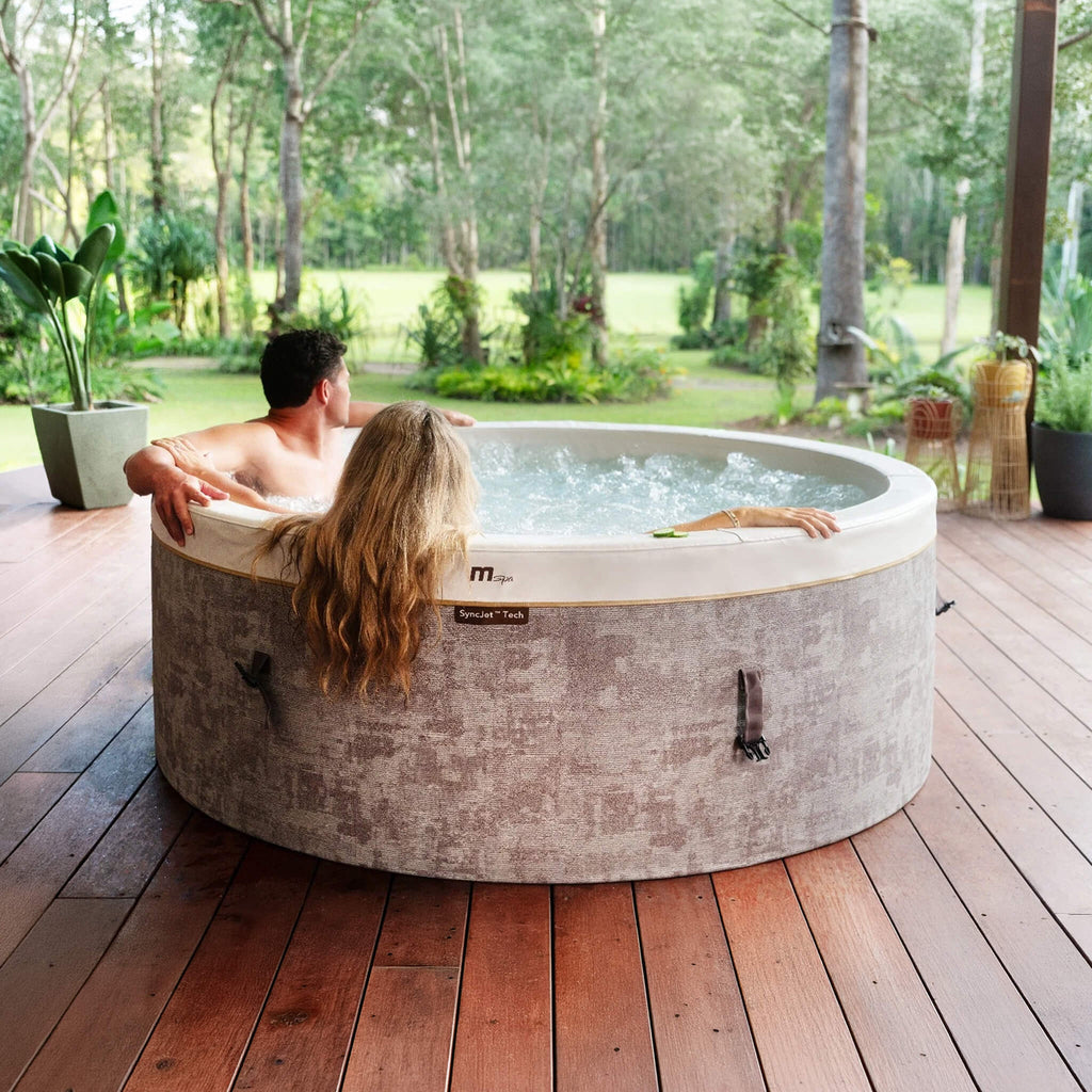 MSpa Cocoon Verto Series Six-Person Inflatable Round Hot Tub With Hydromassage [F-CO066WE] (SAK50928) - Saksby Wholesale - Lifestyle With Man And Woman Inside