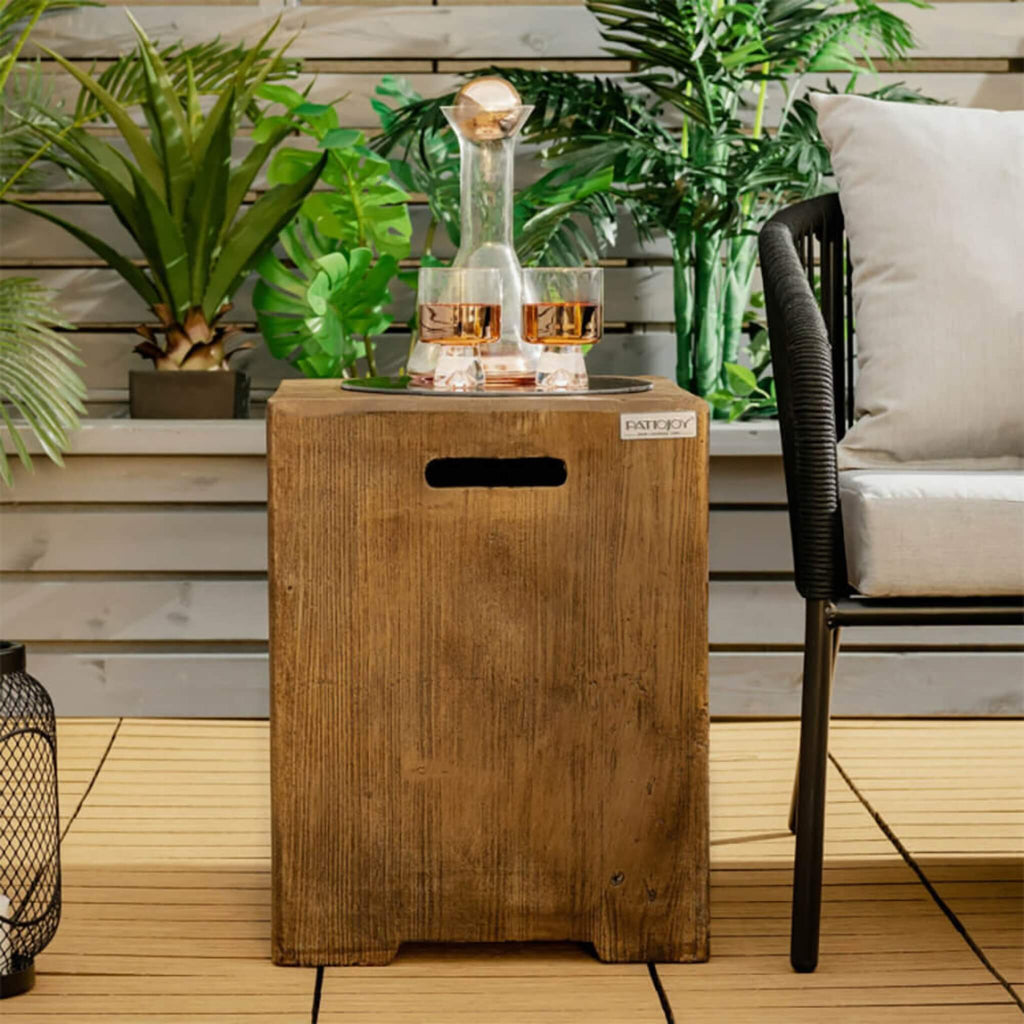 Premium 16-Inch Outdoor Hideaway Table Cover For Standard 20 LBS Propane Tank (SAK73142) - Saksby Wholesale - Lifestyle Image In Patio