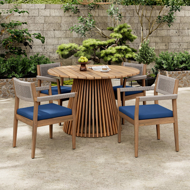 Outdoor Wooden Dining Set With Blue Cushions On A Patio - Saksby Wholesale
