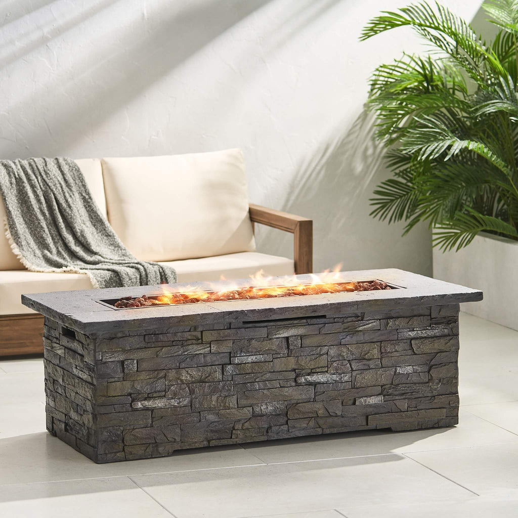 Premium 56" Outdoor Rectangular Concrete Propane Fire Pit With Faux Stone Pattern,50K BTU (SAK31845) - Saksby Wholesale - Lifestyle View

