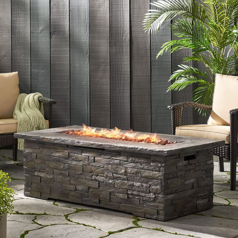 Premium 56" Outdoor Rectangular Concrete Propane Fire Pit With Faux Stone Pattern,50K BTU (SAK31845) - Saksby Wholesale - Lifestyle View