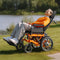 Premium Lightweight Electric Full Reclining Motorized Foldable Wheelchair (SAK91516) Saksby – Lifestyle with Man Sitting on It