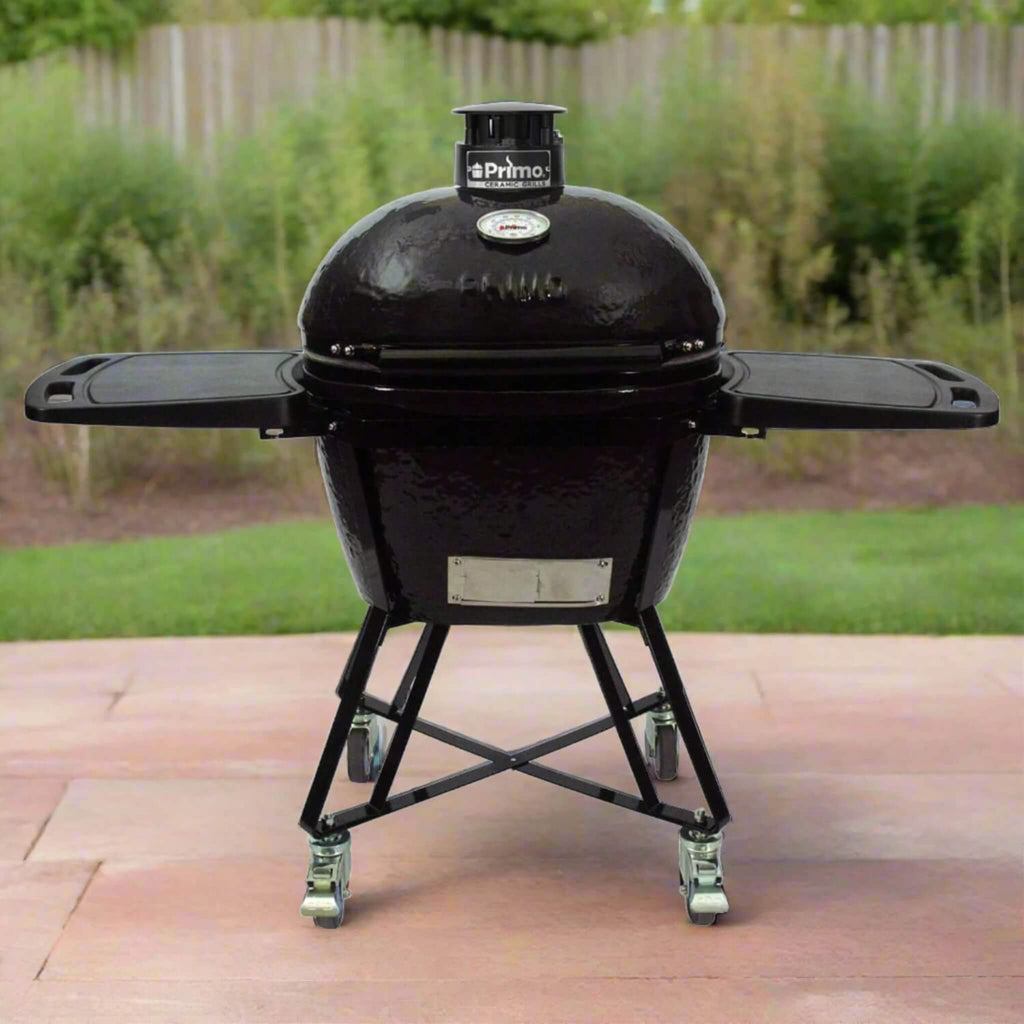 Primo Oval Large 300 All-In-One Ceramic Kamado Grill W/ Cradle, Side Shelves & Stainless Steel Grates [PGCLGC] (SAK21293) - Saksby Wholesale - Front View Lifestyle Image