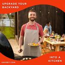 Primo Oval Large 300 All-In-One Ceramic Kamado Grill W/ Cradle, Side Shelves & Stainless Steel Grates [PGCLGC] (SAK21293) - Saksby Wholesale - Lifestyle Image