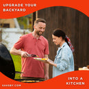 Primo Oval Large 300 Ceramic Kamado BBQ Grill W/ Stainless Steel Grates [PGCLGH] (SAK14871) - Saksby Wholesale - Lifestyle Image