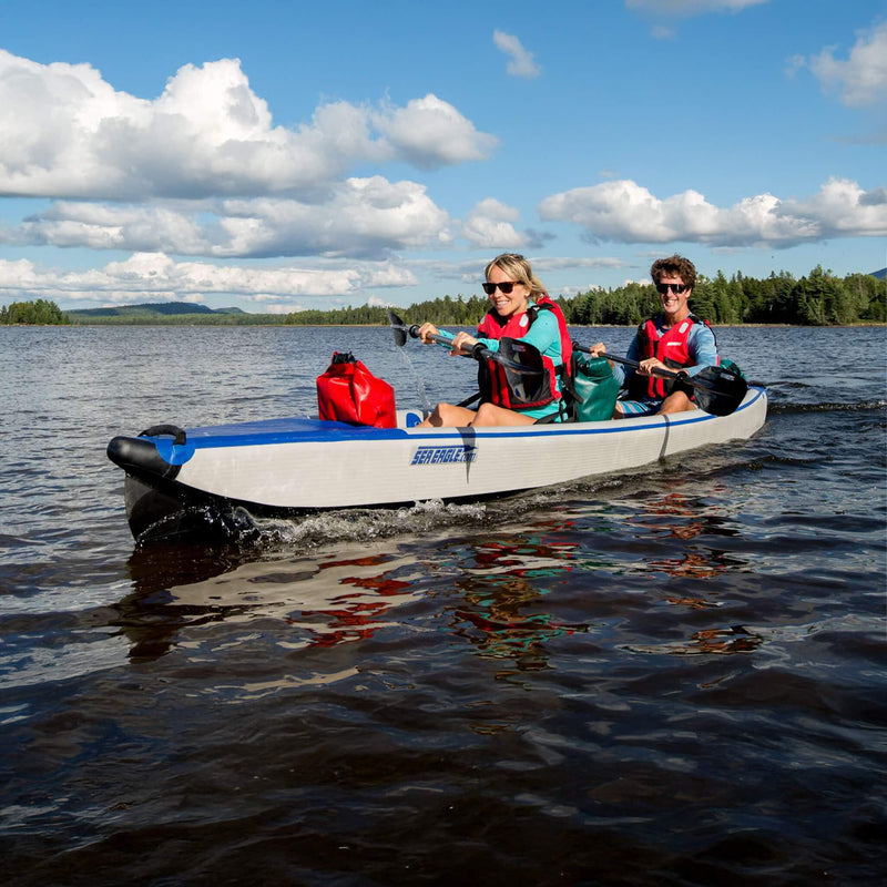 Two People In A Kayak On A Lake With A Scenic Background - Saksby Wholesale