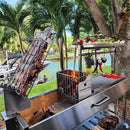 Tagwood BBQ Argentine Santa Maria Wood-Fire Charcoal Gaucho Grill BBQ06SS - SAK62378 - Lifestyle with Food on Rack Close-Up