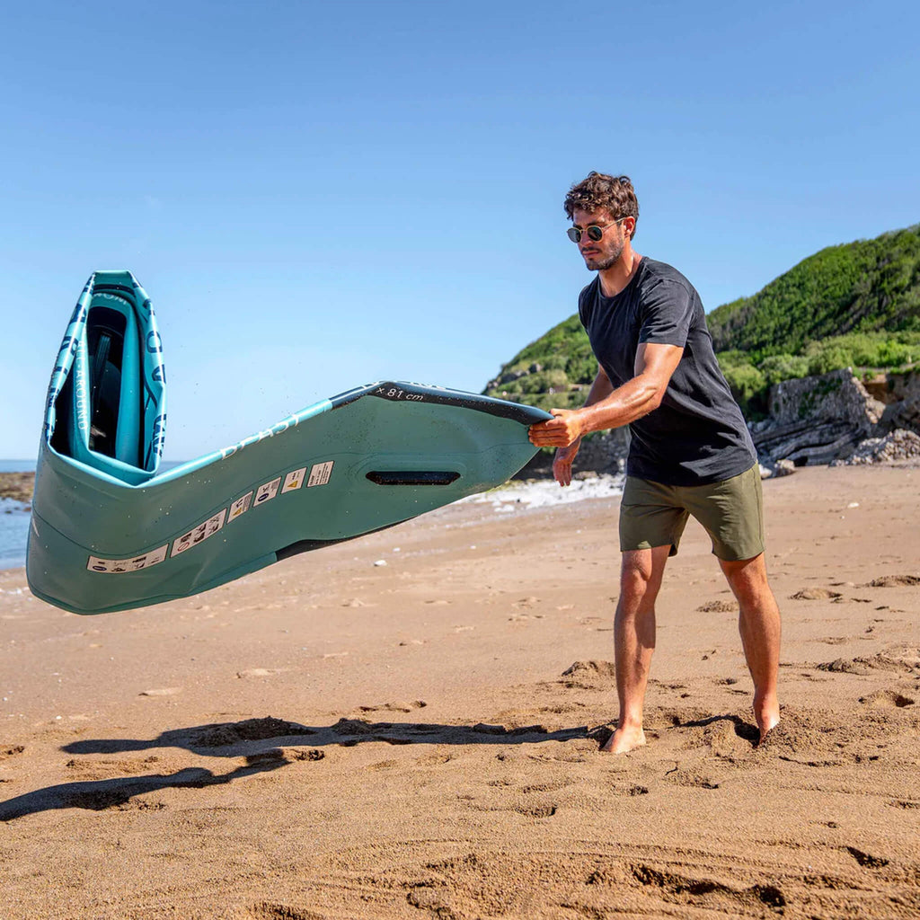 Aqua Marina Breeze 9FT Green Compact Inflatable SUP With Drop Stitch Light Technology [BT-23BRP] (SAK68745) - Saksby Wholesale - Man Unpacking Demonstration View