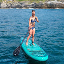 Aqua Marina Breeze 9FT Green Compact Inflatable SUP With Drop Stitch Light Technology [BT-23BRP] (SAK68745) - Saksby Wholesale - Woman Paddling On The Sea Lifestyle View