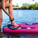 Pop Board Co. Inflatable Board 10'6 Royal Hawaiian Pink/Black (SAK36410) - Saksby Wholesale - Strap Lifestyle View