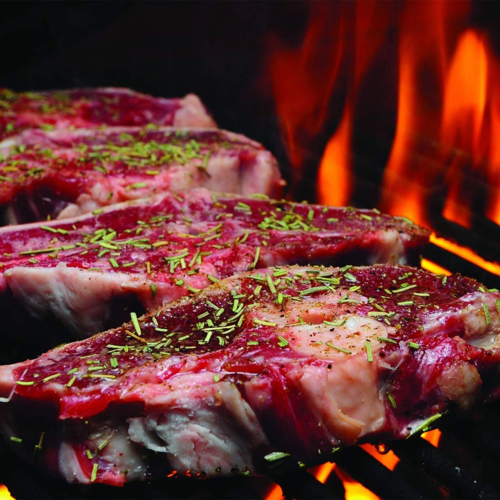 PRIMO Oval Large 300 Ceramic Kamado BBQ Grill W/ Stainless Steel Grates - PGCLGH (95414871) - SAKSBY.com - Demonstration View of Steak on Grill